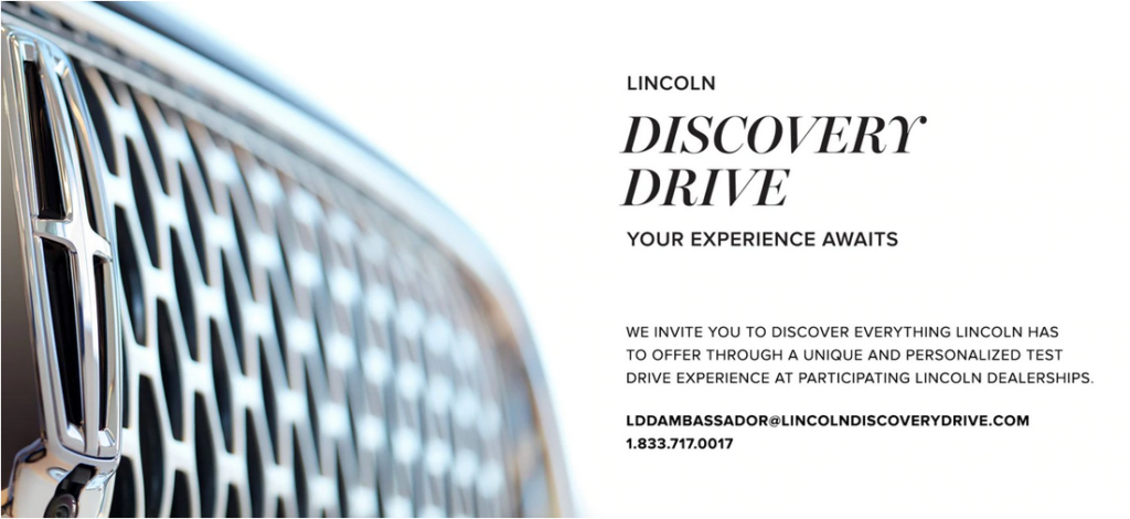 Close-up of Lincoln car grille with text inviting to a unique test drive experience. Contact details included.