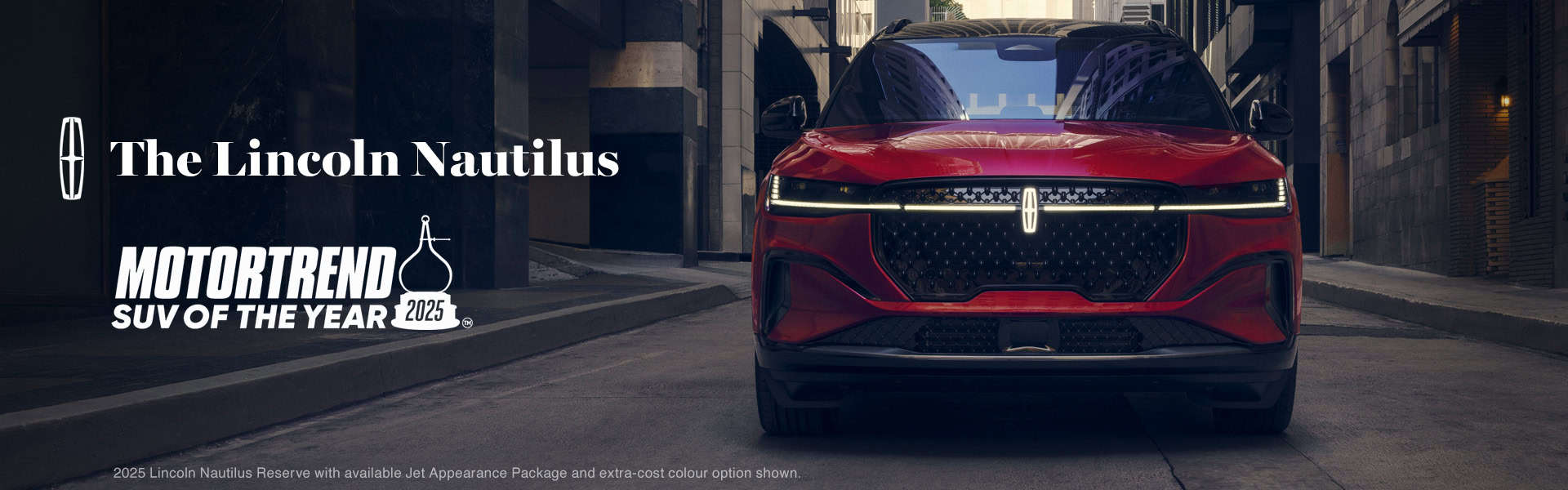 Front view of a red 2025 Lincoln Nautilus, awarded MotorTrend SUV of the Year