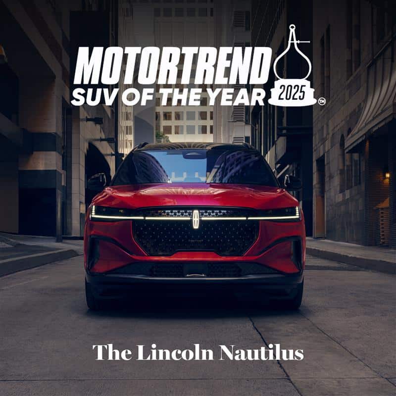 Front view of a red 2025 Lincoln Nautilus, awarded MotorTrend SUV of the Year